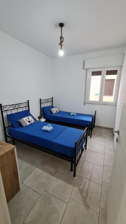 Postel nebo postele na pokoji v ubytování Appartamenti Mirante