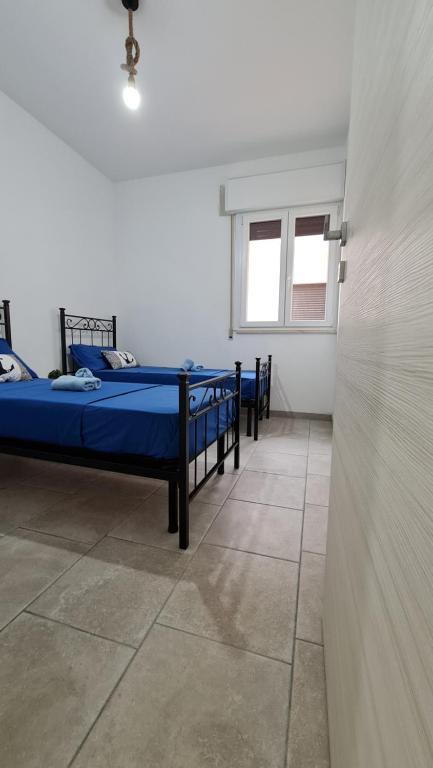 Postel nebo postele na pokoji v ubytování Appartamenti Mirante