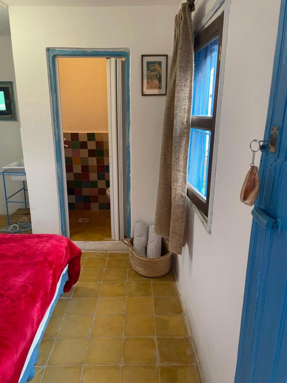 Postel nebo postele na pokoji v ubytování Dar El Pirata Hostel