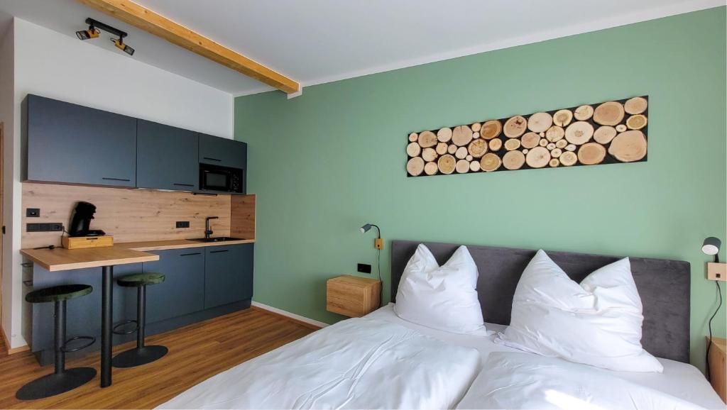 Postel nebo postele na pokoji v ubytování MK Appartements