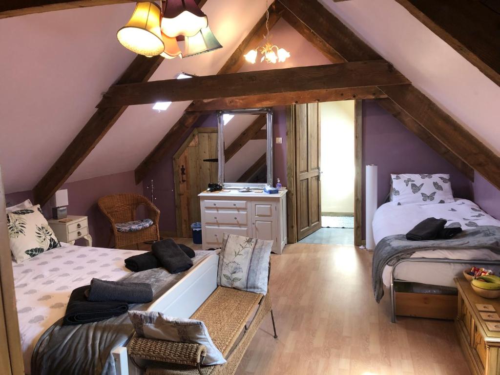 Postel nebo postele na pokoji v ubytování La forge b&b
