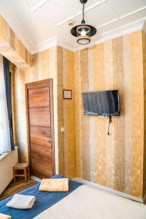 Postel nebo postele na pokoji v ubytování Asitane Life Hotel