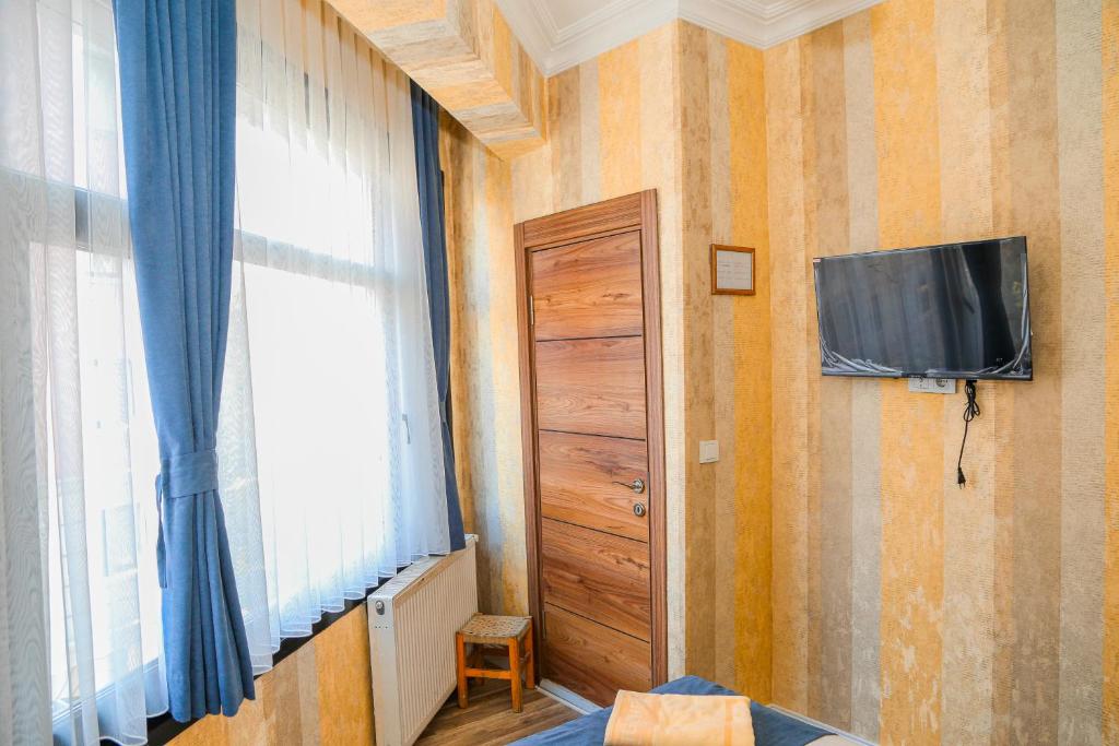 TV a/nebo společenská místnost v ubytování Asitane Life Hotel
