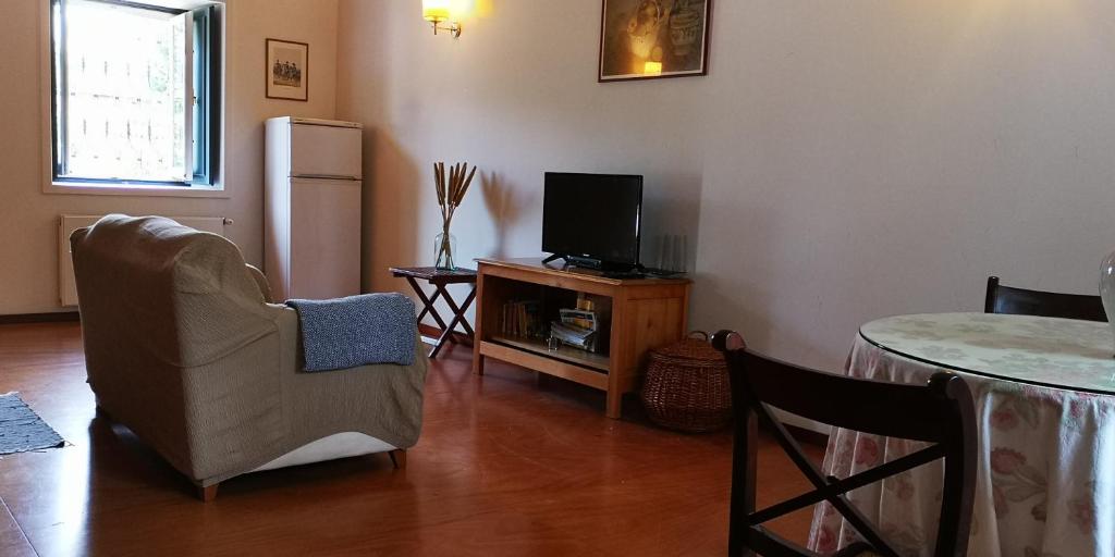 TV a/nebo společenská místnost v ubytování Palácio da Quinta da Portela IV