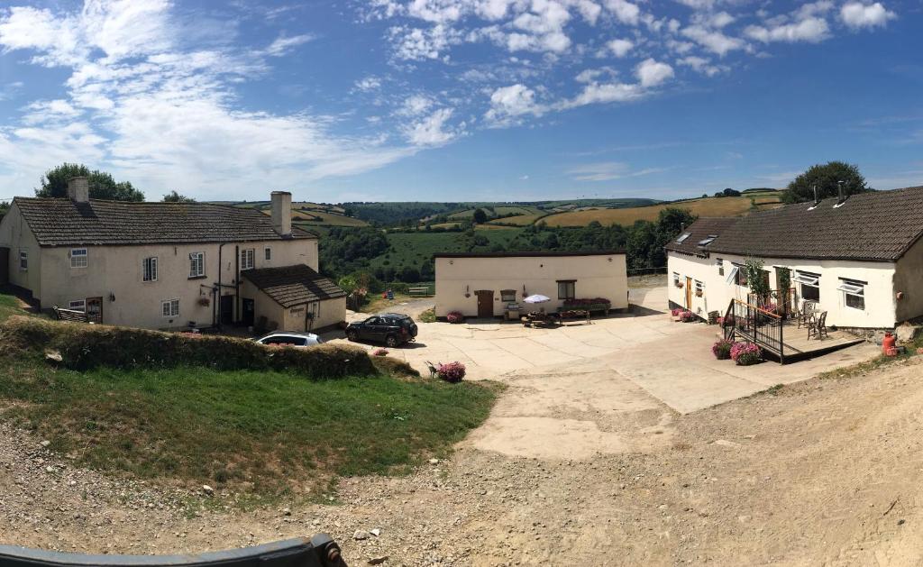 an aerial view of a house and a driveway at Characteristic 6-Bed Cottage on Exmoor in Minehead