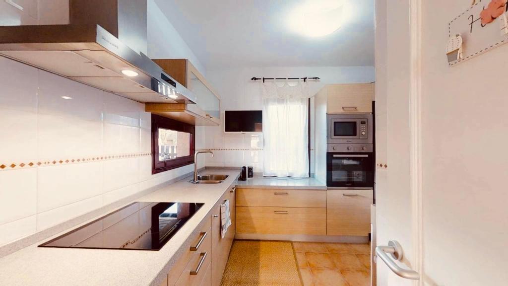 Kuchyň nebo kuchyňský kout v ubytování MAISON SAJARELLE