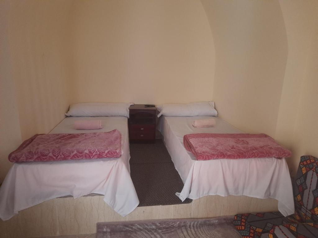 Postel nebo postele na pokoji v ubytování Sun house