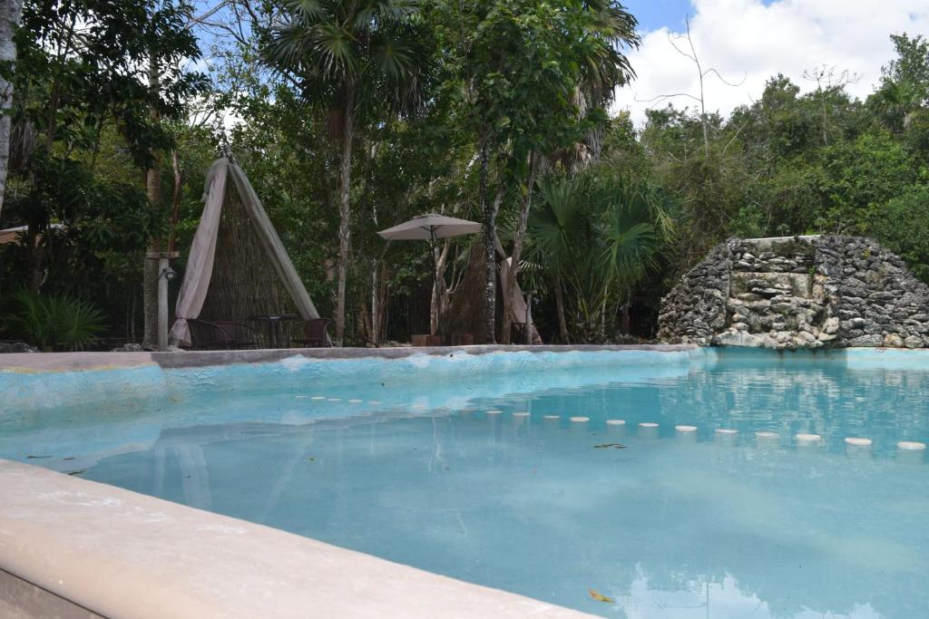 Bazén v ubytování Jolie Jungle Eco Hotel nebo v jeho okolí