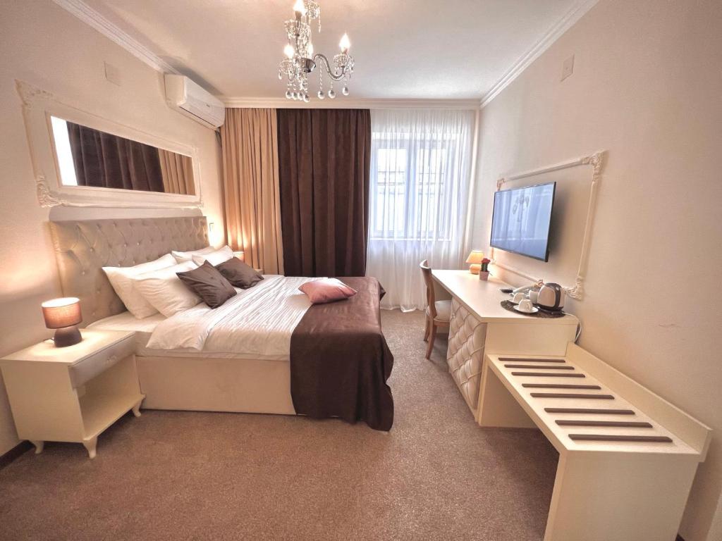 Postel nebo postele na pokoji v ubytování International Inn