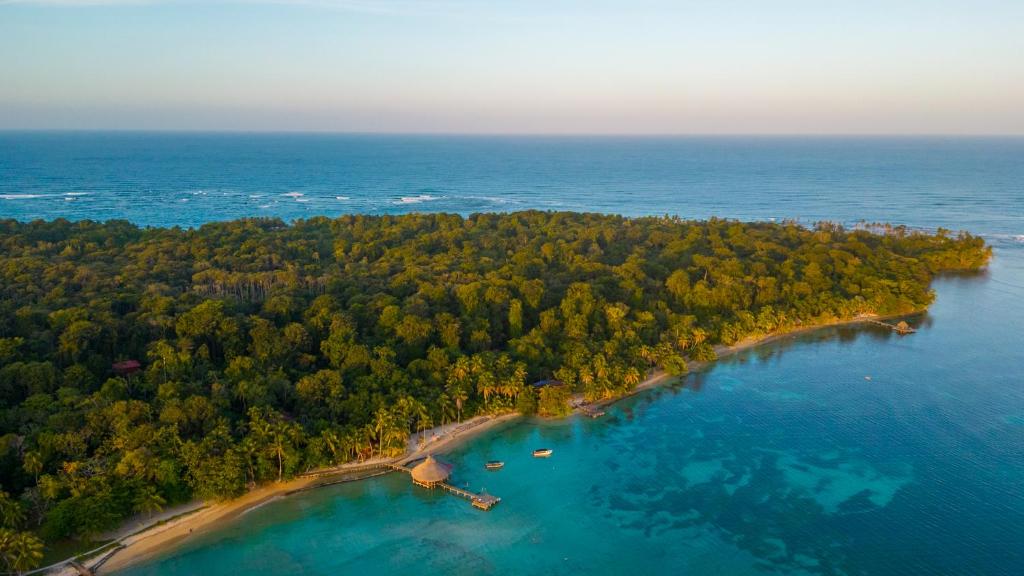 an aerial view of an island in the water at Casa Cayuco Eco-Adventure Lodge in Bocas del Toro