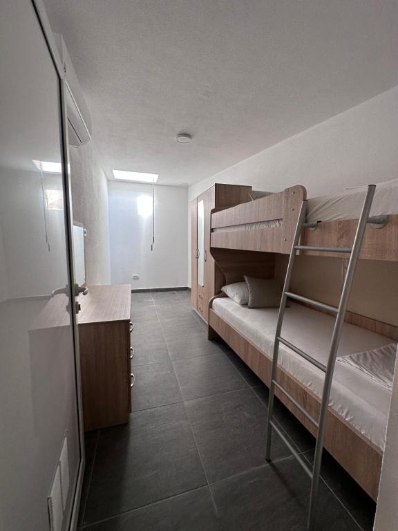 Voodi või voodid majutusasutuse Hotel MonteNino toas