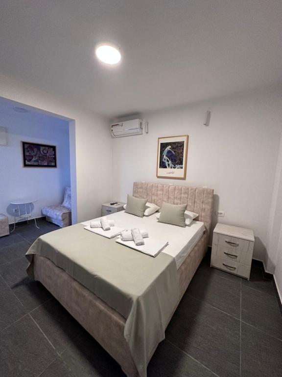 Voodi või voodid majutusasutuse Hotel MonteNino toas
