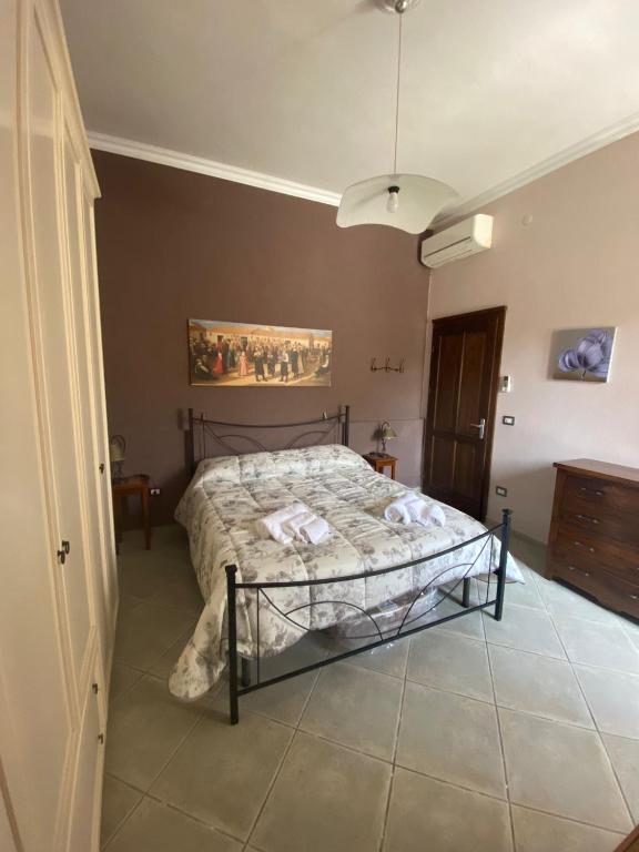 Postel nebo postele na pokoji v ubytování B&B Su Frori Arrubiu