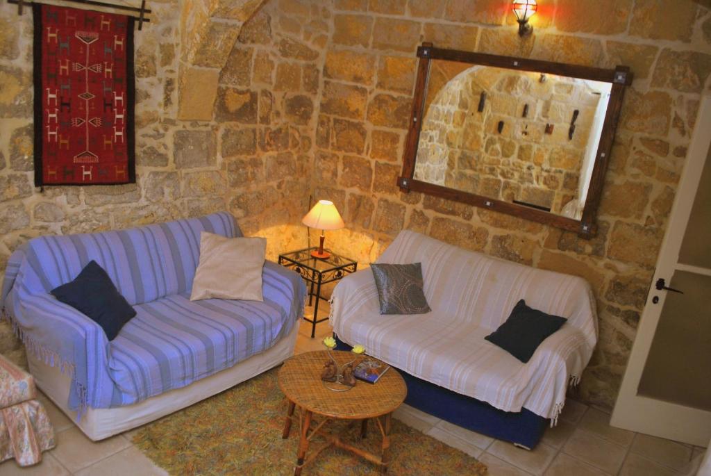 Posezení v ubytování Dar Ghax-Xemx Farmhouse