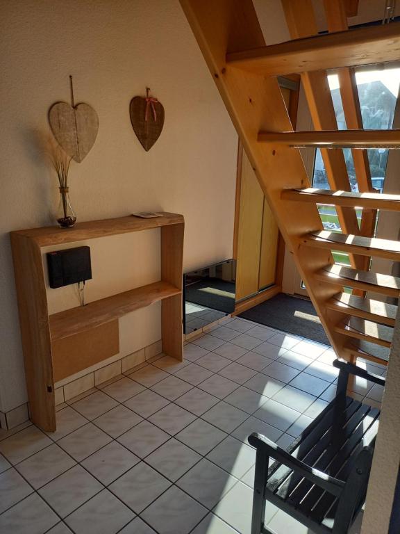 Televízia a/alebo spoločenská miestnosť v ubytovaní Duplex 5 pers tout compris avec piscine