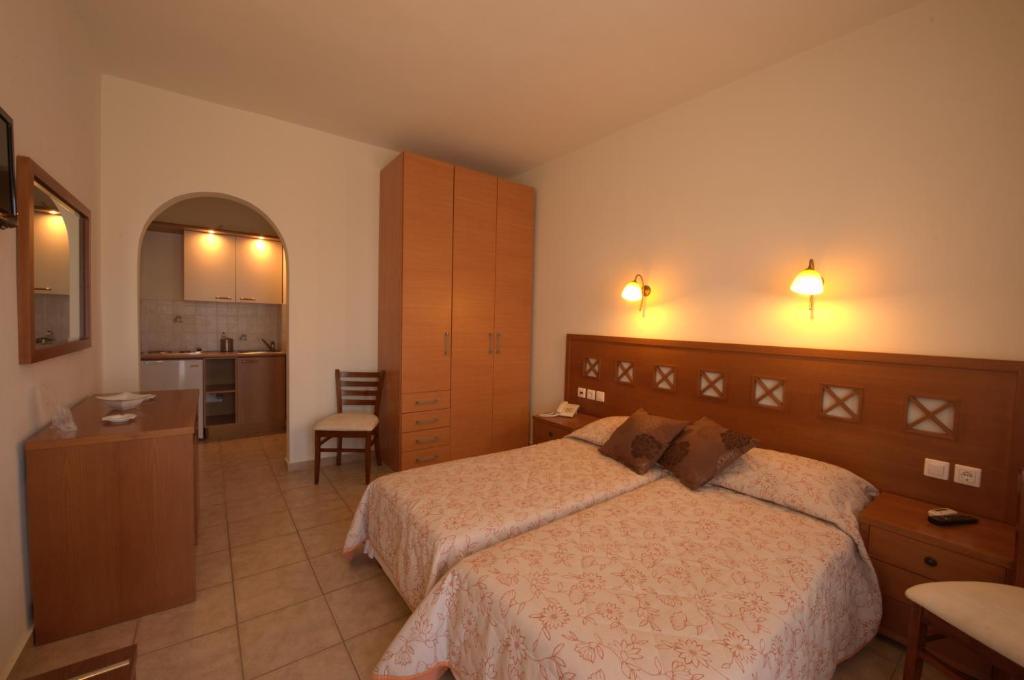 Postel nebo postele na pokoji v ubytování Summer Time - Tinos Apartments