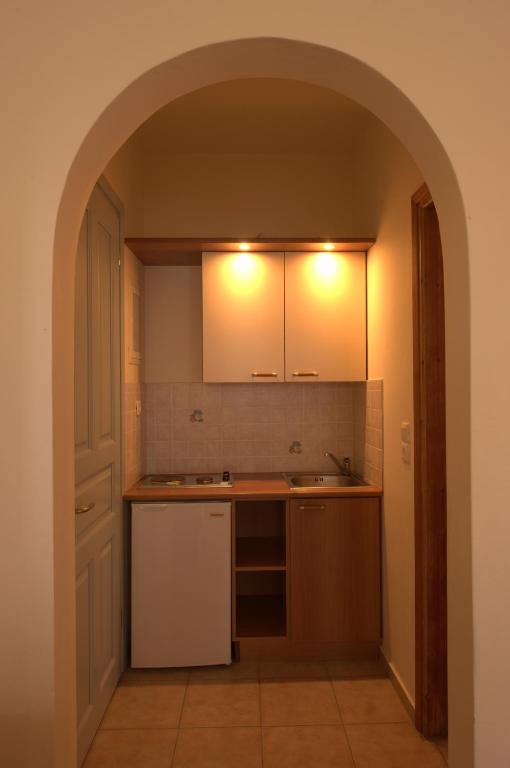 Kuchyň nebo kuchyňský kout v ubytování Summer Time - Tinos Apartments