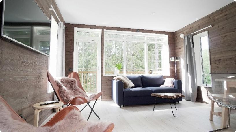 Predel za sedenje v nastanitvi Chalet with sauna, JÄRVSÖ