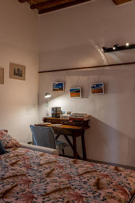 Postel nebo postele na pokoji v ubytování La sosta di Arrigo