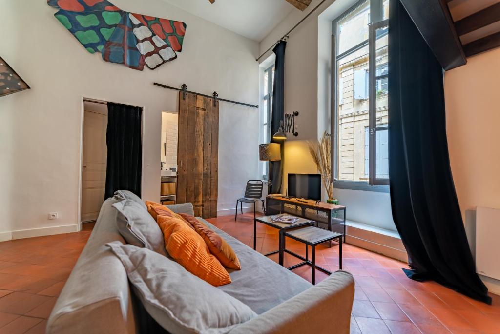Posedenie v ubytovaní Loft calme à la Maison Carrée - Une Nuit à Nîmes
