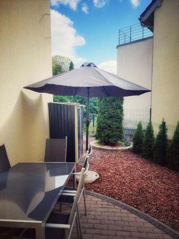 Patio nebo venkovní prostory v ubytování Komandorska Apartments