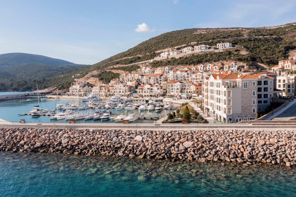 a view of a harbor with boats in the water at The Chedi Luštica Bay in Tivat