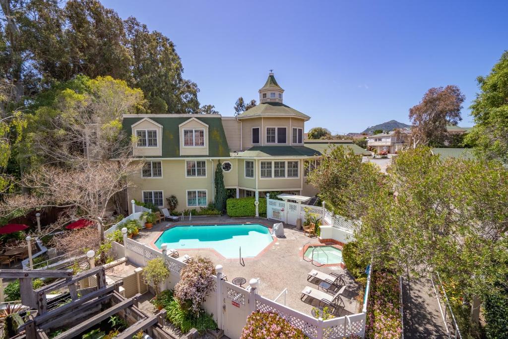 an aerial view of a house with a swimming pool at Apple Farm Inn in San Luis Obispo