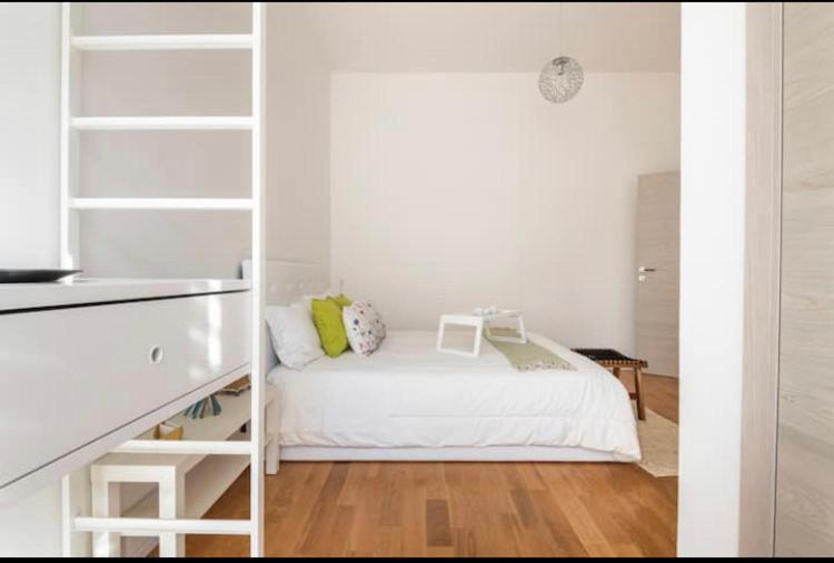 Postel nebo postele na pokoji v ubytování Meraki B&B