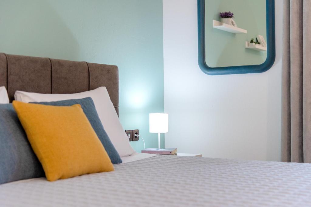 A bed or beds in a room at OUTParga Apartment 3