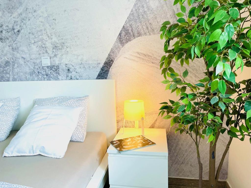 Postel nebo postele na pokoji v ubytování Anapartments