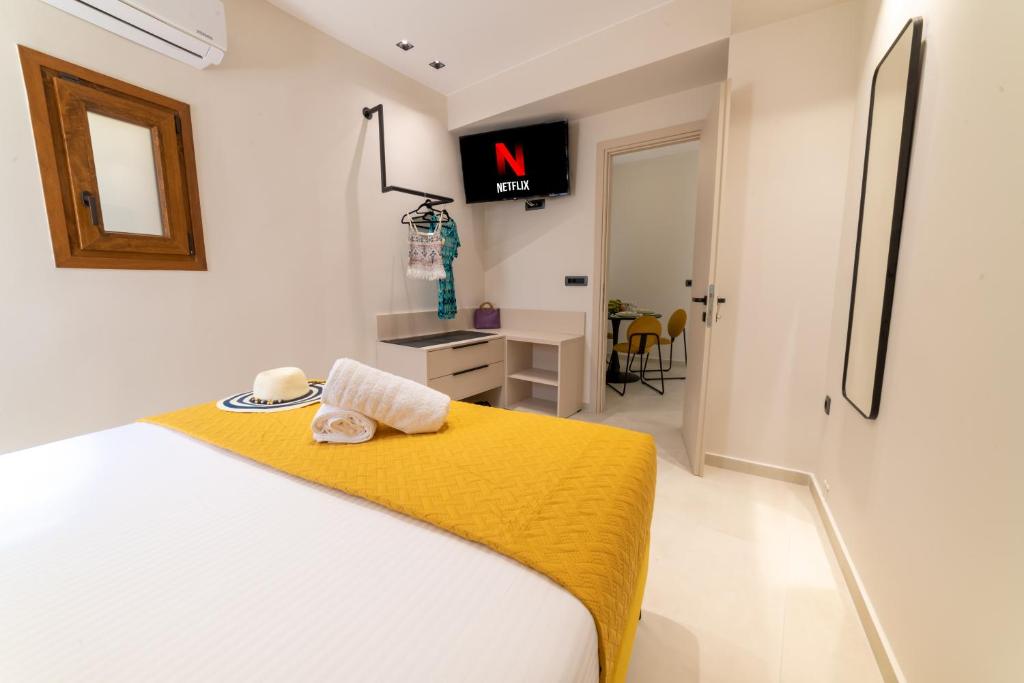 Posteľ alebo postele v izbe v ubytovaní Bella Vasilica Luxury Apartments
