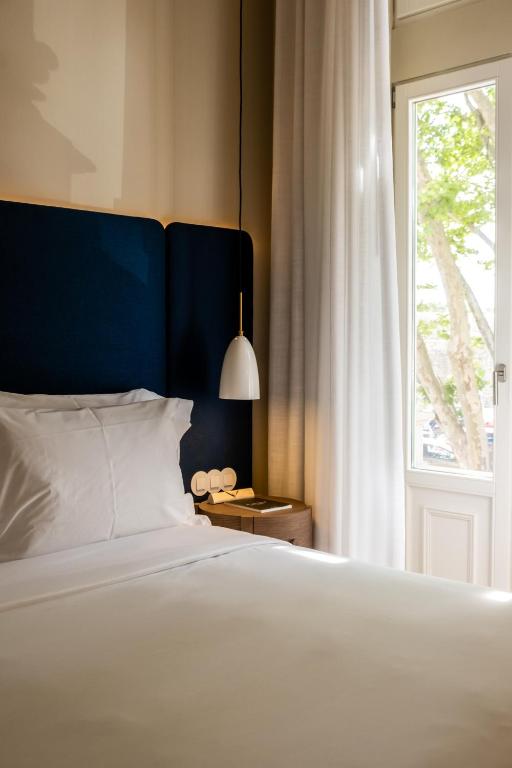 Cama ou camas em um quarto em Artsy Cascais