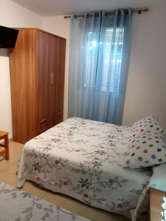 Posteľ alebo postele v izbe v ubytovaní Apartamento As Irmas