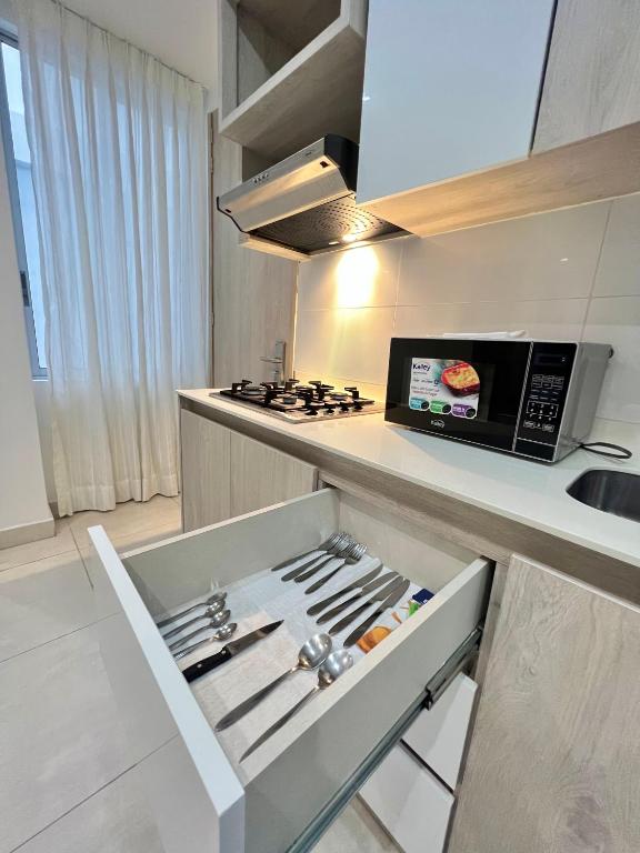 Kuchyň nebo kuchyňský kout v ubytování Apartamentos Loft Mikonos
