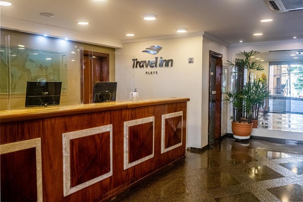a lobby of a hotel with a reception desk at Travel Inn Park Avenue Jardins in São Paulo