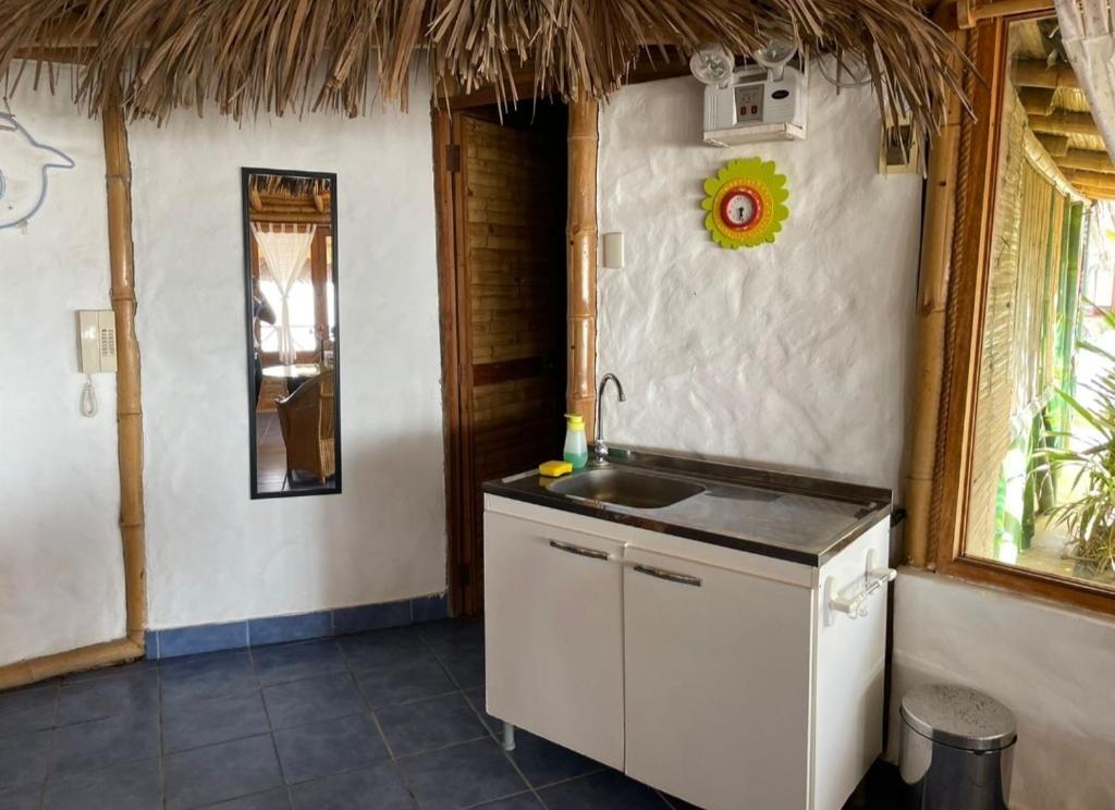 Kuchyň nebo kuchyňský kout v ubytování Bora Bora Bungalows