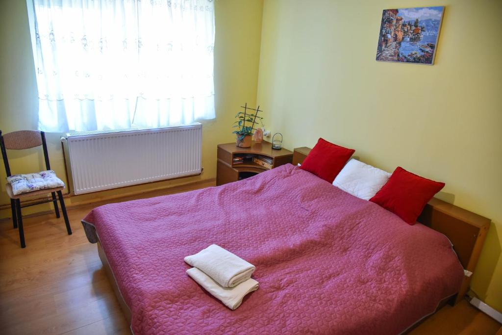 Una cama o camas en una habitación de sobe MAŠA