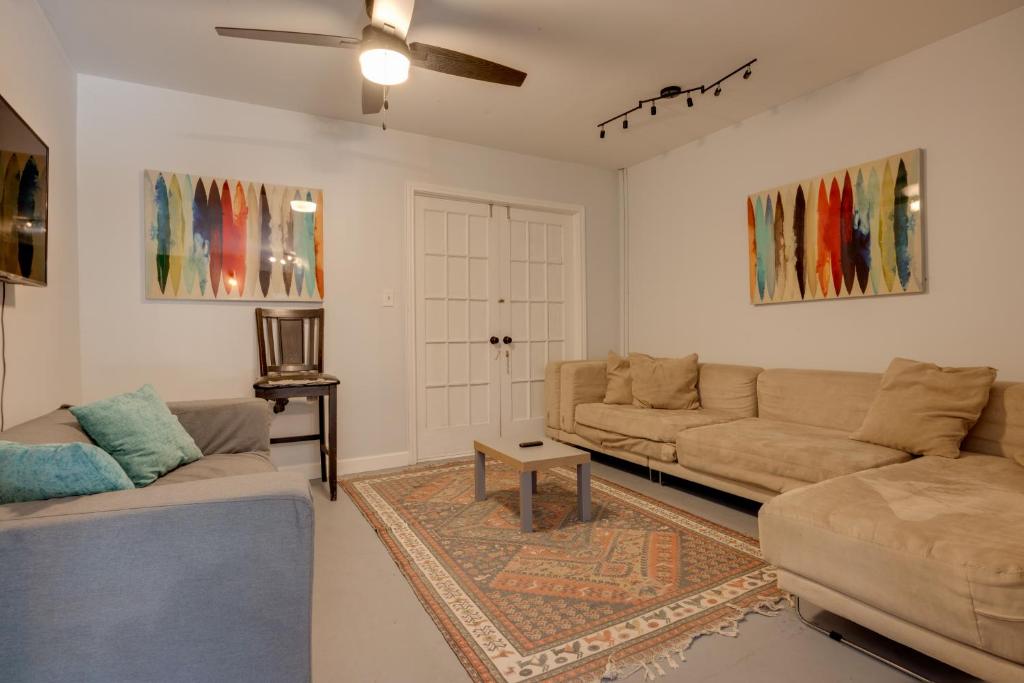 a living room with two couches and a table at San Marcos Apartment on 10 Acres about 6 Mi to TSU! in San Marcos