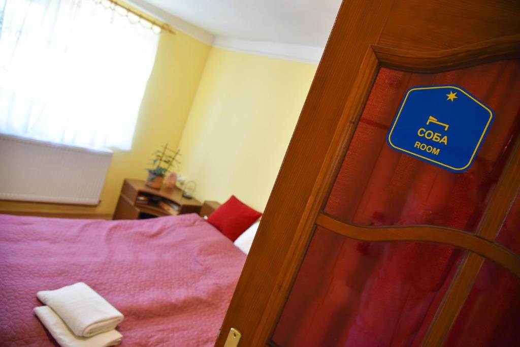 Una cama o camas en una habitación de sobe MAŠA