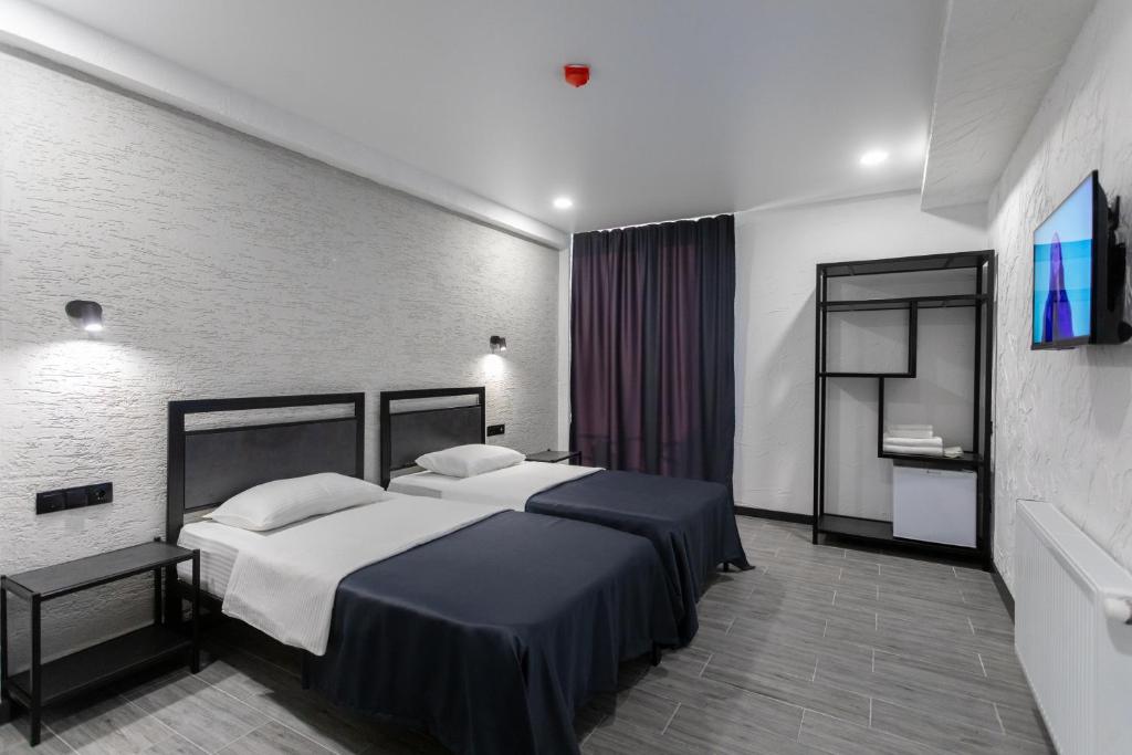 Hotel West Way - Habitación Gemela Con Baño Privado