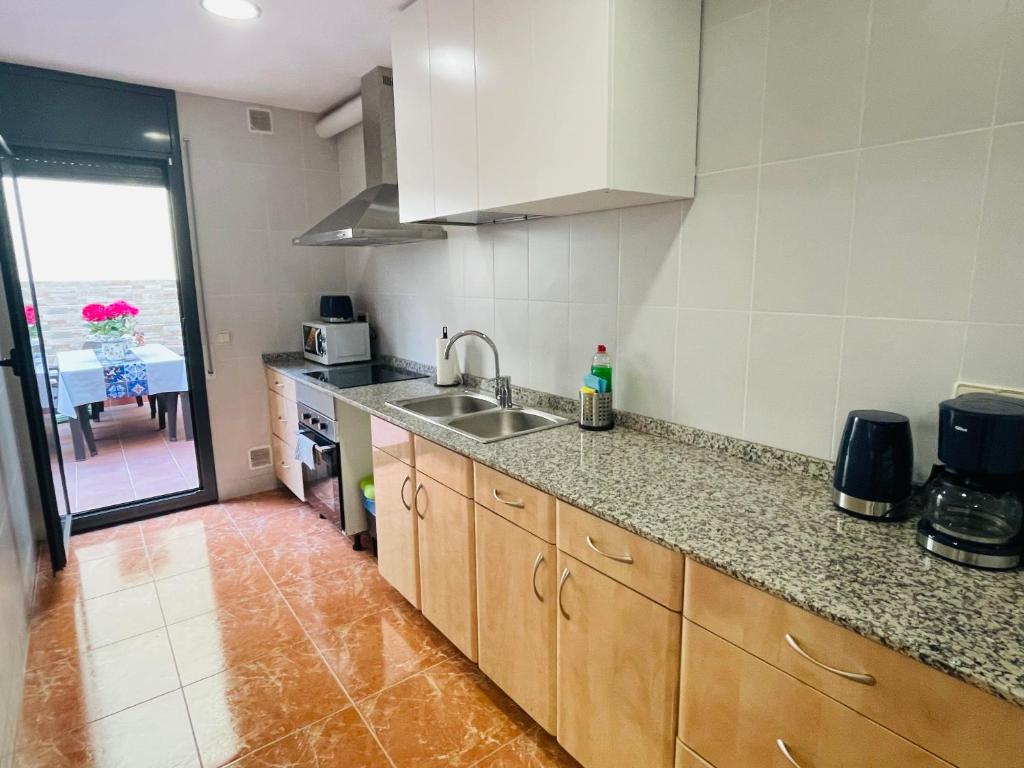 Kuchyň nebo kuchyňský kout v ubytování Beach Apartment Artigas
