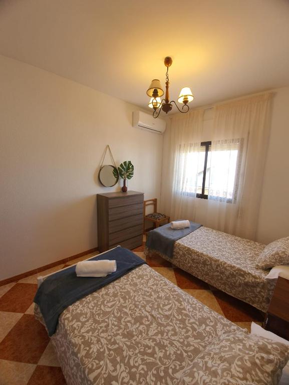 Postel nebo postele na pokoji v ubytování casa grande en Córdoba, pueblo de la Victoria , 6 dormitorios