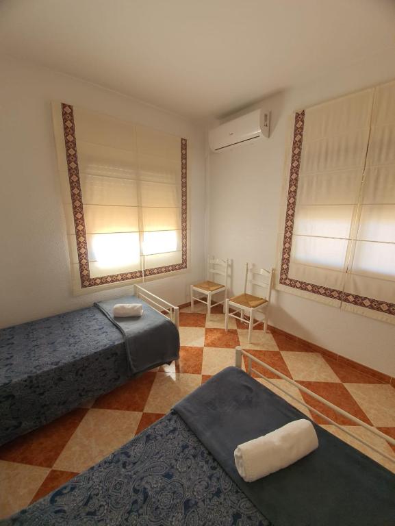 Postel nebo postele na pokoji v ubytování casa grande en Córdoba, pueblo de la Victoria , 6 dormitorios