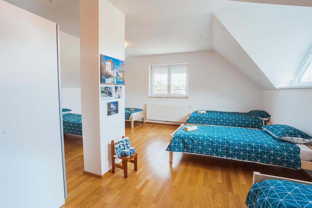 Postel nebo postele na pokoji v ubytování Apartment Sneznik