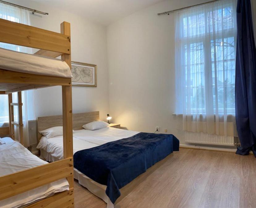 Postel nebo postele na pokoji v ubytování Aquamarine Hotel - Lauluväljak