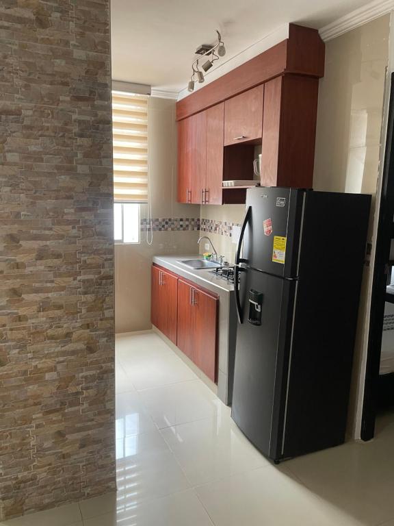 Kuchyň nebo kuchyňský kout v ubytování Alojamientos Cartagena Edificio Los Delfines