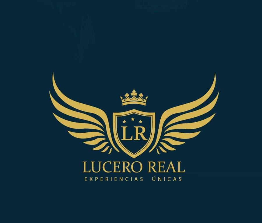 a luxury crest with wings and a crown at HOTEL LUCERO REAL in Tacna
