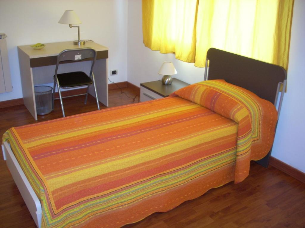 A bed or beds in a room at Eurelios