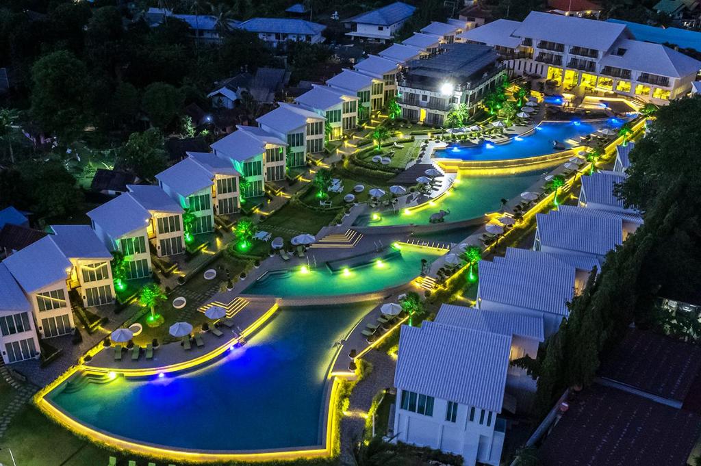 an aerial view of a resort at night at Vannee Golden Sands Beachfront Resort in Haad Rin