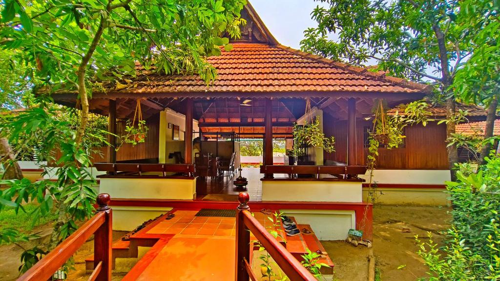 Zahrada ubytování Coconut Lagoon Kumarakom - A CGH Earth Experience